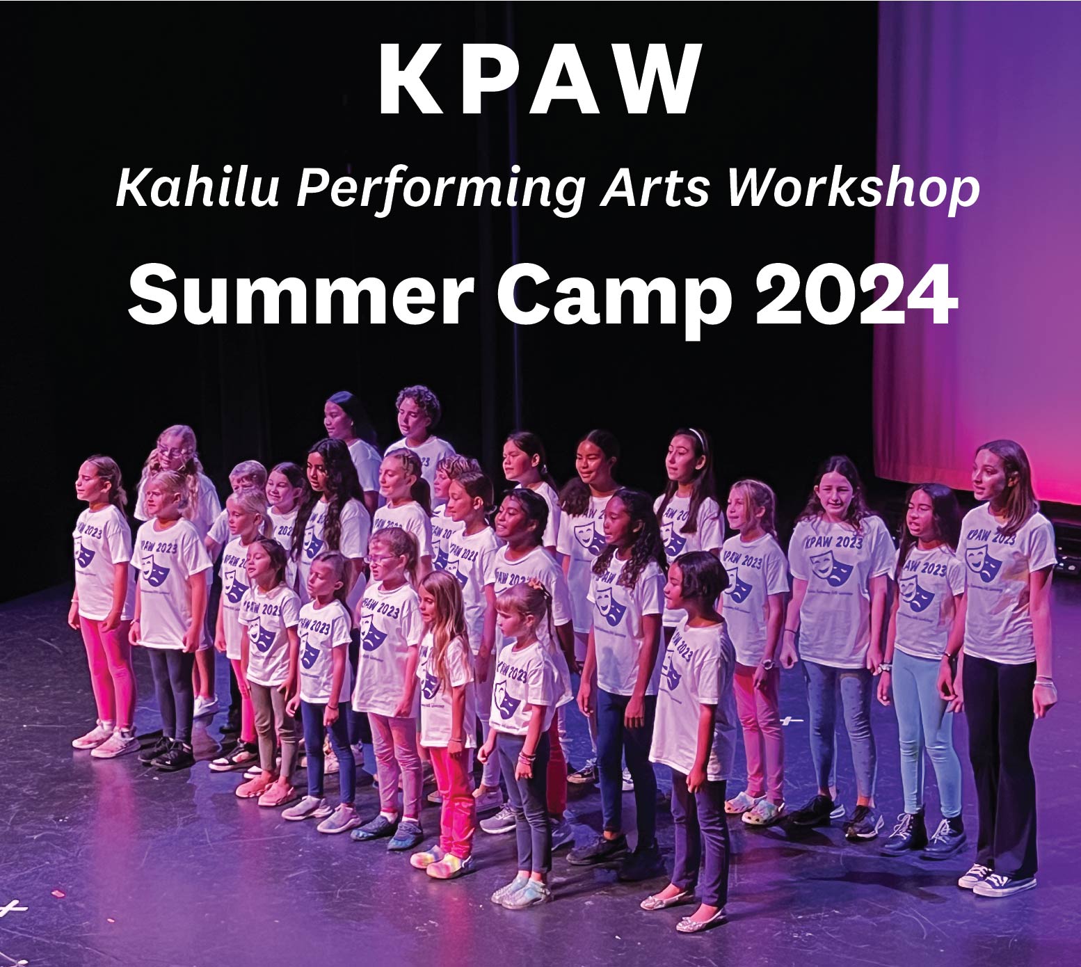 Group of children on stage wearing matching t-shirts for the kpaw summer camp 2024 at kahilu performing arts workshop.