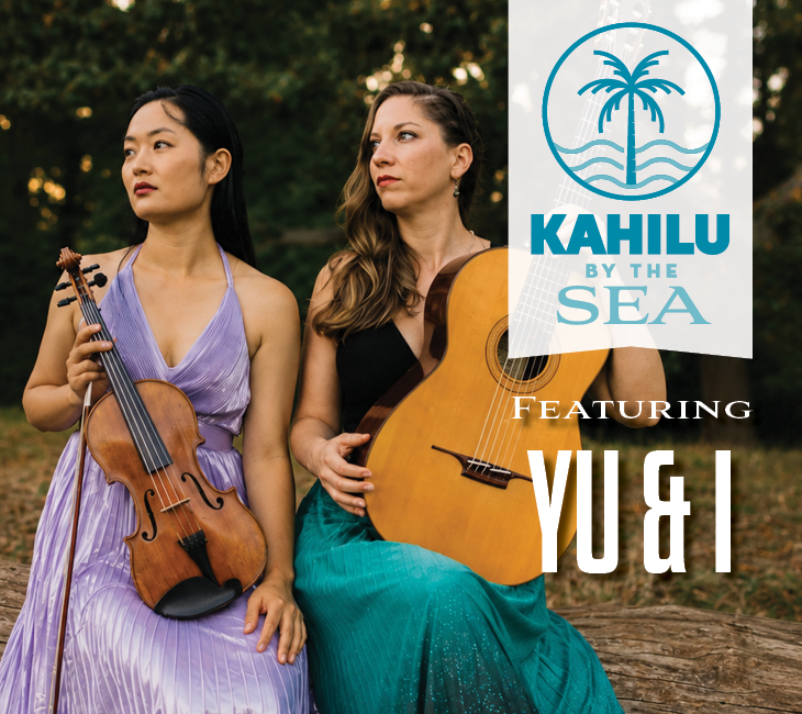 Two women sit outdoors, one holding a violin, the other a guitar. A logo reads “Kahilu by the Sea” with text below: “Featuring Yu & I.” Trees are visible in the background.